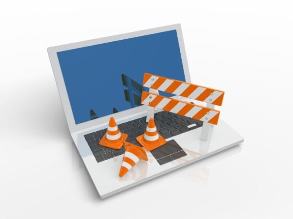 Website under construction with Laptop