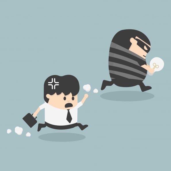 Thief stealing bulb from another Businessman