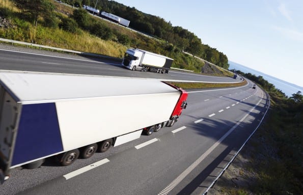 trucks in opposite directions on freeway