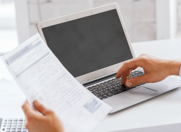 miling businessman working in office