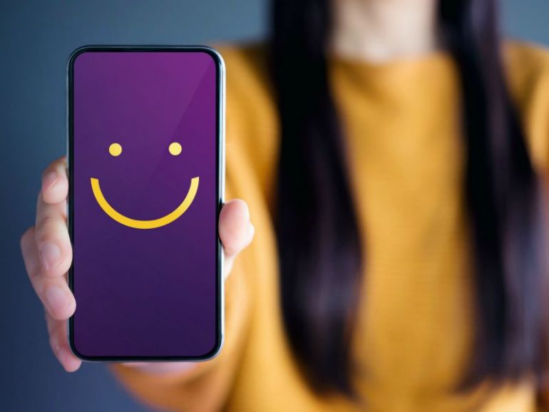 Blije emoji als illustratie van een positieve customer experience (CX)