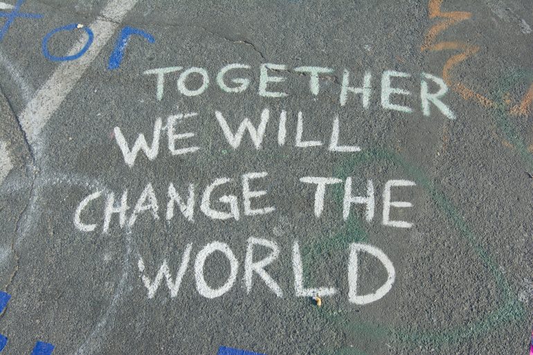 Tekst: together we will change the world