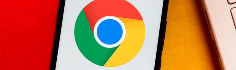Chrome logo op telefoon bij artikel over Chrome-extensies