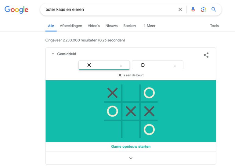 Screenshot van de Easter Egg in Google: het spelletje boter, kaas een eieren.