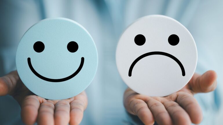 Een blije en sippe smiley.