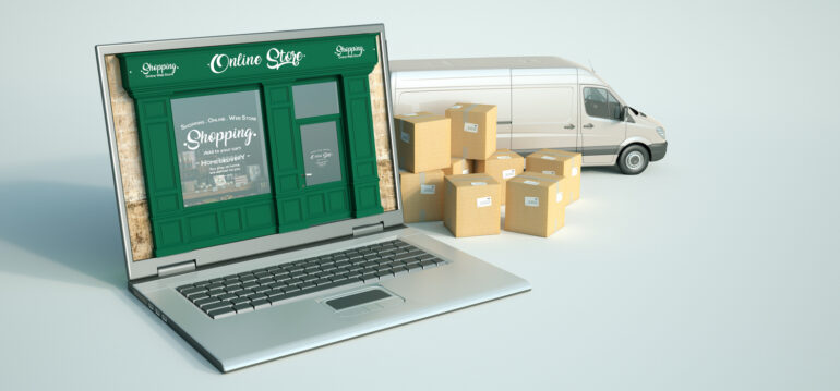 3D rendering of a computer with a traditional shop on the screen and a transportation background
