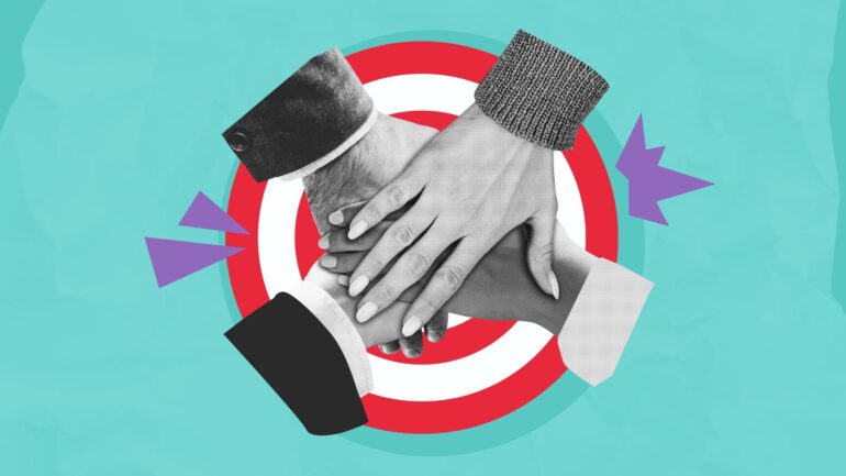 Handen op elkaar boven een rood-wit target.